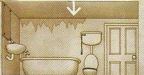A bathroom with a bath, a sink and a toilet