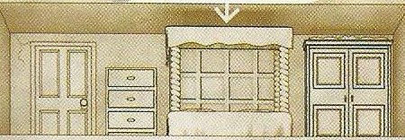 A bedroom with a bed, a chest of drawers and a wardrobe