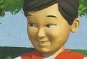 The face and head of a smiling boy