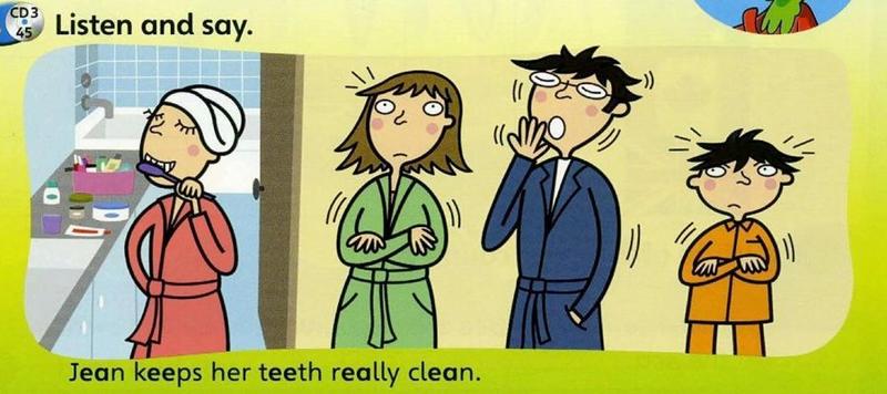 Four people in dressing gowns; one brushes her teeth. The sentence says Jean keeps her teeth really clean.