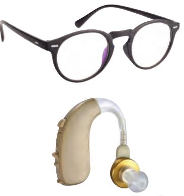A pair of spectacles and a hearing aid