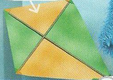 A green and orange kite