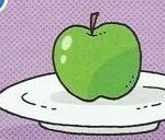 A green apple on a white plate