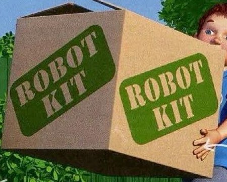 A big cardboard box with the words Robot Kit on it