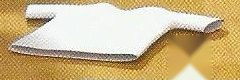 A white T-shirt lying on a wooden floor