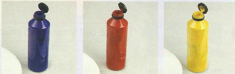 Three bottles of paint: blue, red and yellow