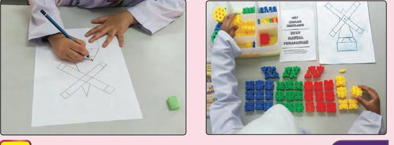 Seorang murid melakar kincir angin pada kertas, dan komponen disusun mengikut warna di atas meja