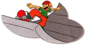 A boy riding a skateboard on a ramp