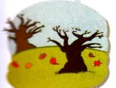 A tree with falling orange leaves