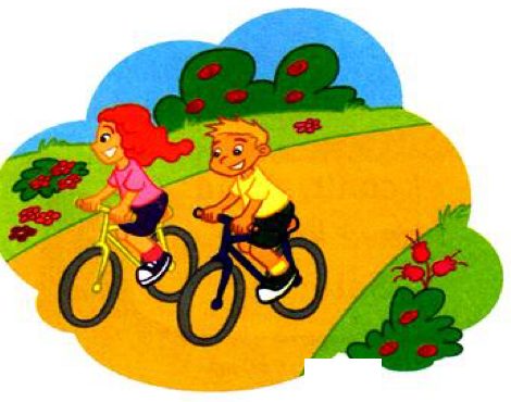 Two children riding bicycles past flowers