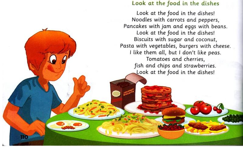A boy at a table full of food: noodles, pancakes, a burger, tomatoes, cherries, fish and chips. The chant Look at the food in the dishes.