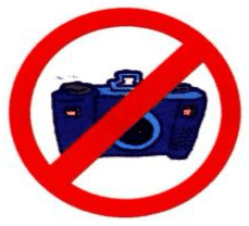 A camera with a red circle and a line across it