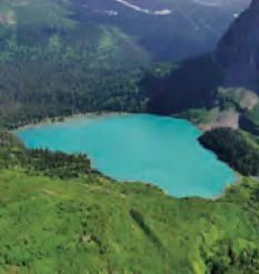 Sebuah tasik di antara bukit hijau