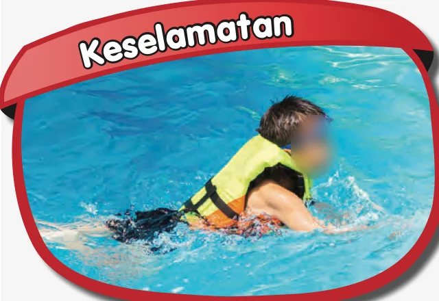 Seorang kanak-kanak berenang memakai jaket keselamatan kuning