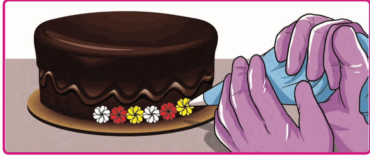 Cream flowers on a cake: white, red, yellow, white, red, yellow