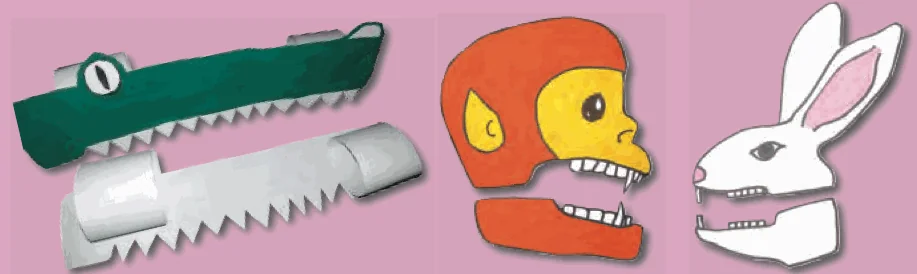 Paper hand puppets of a crocodile, a monkey and a rabbit with teeth