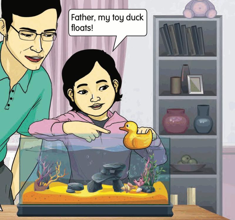 A girl points at a yellow toy duck floating in an aquarium while her father watches