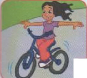 A girl riding a bike with her arms stretched out to the sides