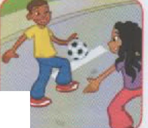Two children kicking a football on the road