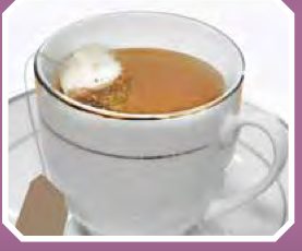 Secawan teh dengan uncang teh