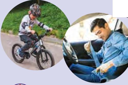 Seorang kanak-kanak memakai topi keledar ketika menunggang basikal dan seorang lelaki memakai tali pinggang keledar di dalam kereta