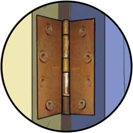 A rusty door hinge with rusted screws
