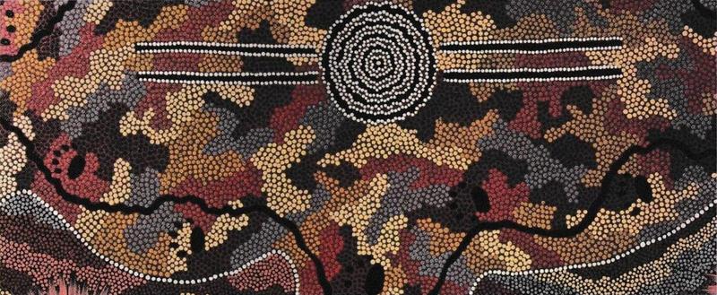Dot painting in brown, red and black with a circle in the middle and wavy lines, representing a songline