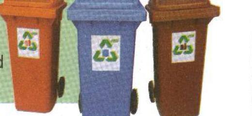 Three recycling bins with a recycling symbol: orange, blue and brown