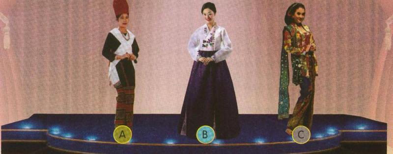 Three models on a stage labelled A, B and C wearing traditional attire from Myanmar, Korea and Indonesia