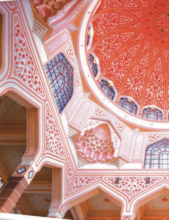 Photograph of the decorated ceiling and dome of Putra Mosque, made of many polygon shapes