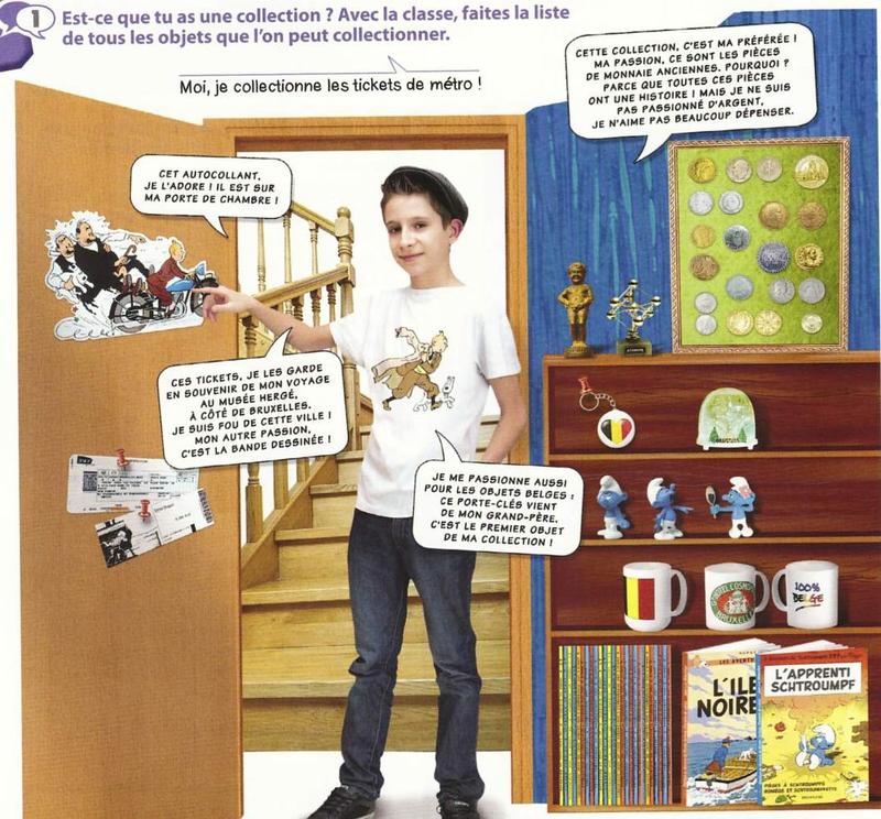 Antoine stands in his bedroom doorway beside shelves with Belgian objects: coins in a frame, key ring, snow globe, Smurf figures, mugs and comic books; a sticker and tickets are on the door