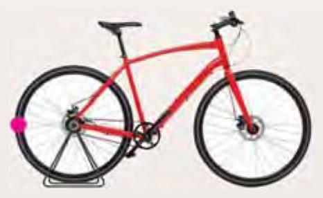 A bicycle with a pink sticker on the front edge of the rear tyre